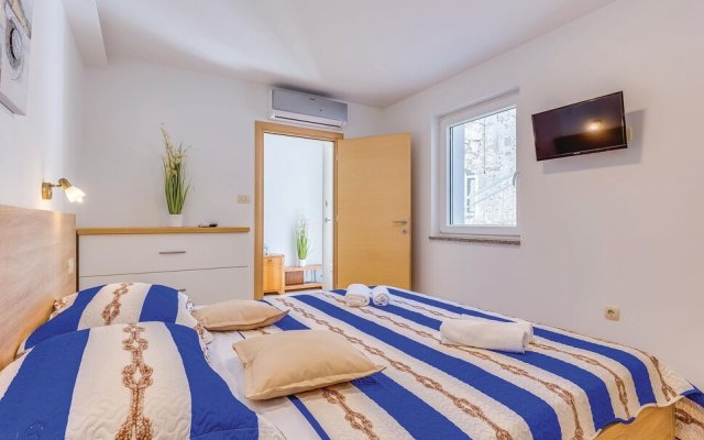 Awesome Home in Novi Vinodolski with WiFi, 4 Bedrooms, Hot Tub