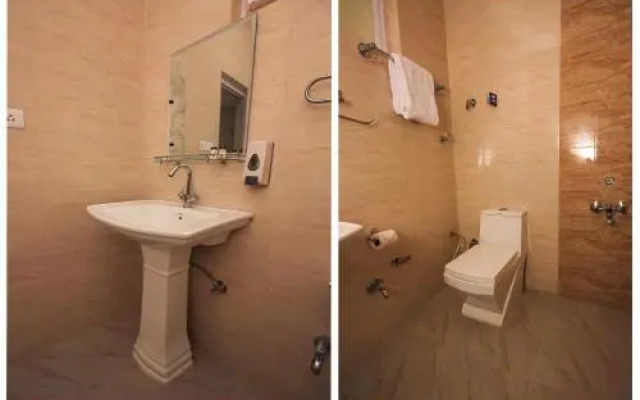Gliders Holiday Inn by OYO Rooms