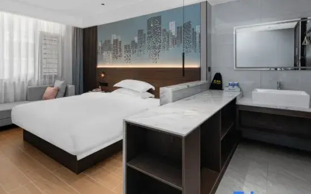 Meinianhua Hotel (Yulin Railway Station Nanxing Plaza)