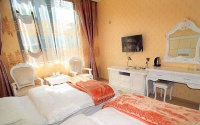 Mingge Busniess Hotel