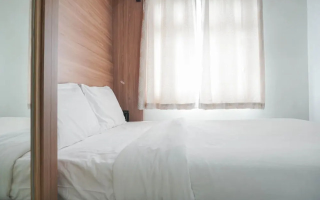 Restful and Tidy 2BR at Green Pramuka City Apartment