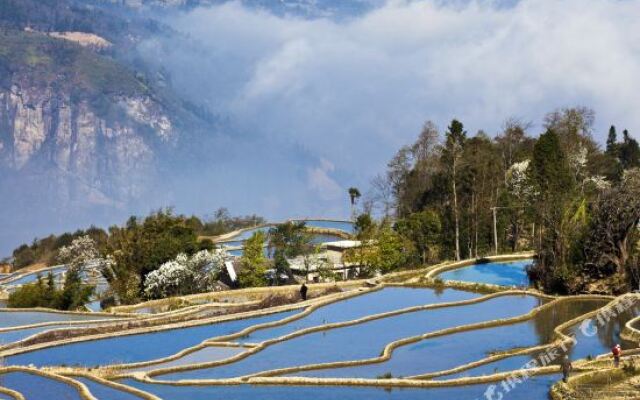 Honghe Yuanyang Duoyishu Yajieju Hostel