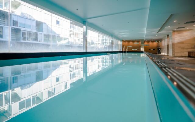 Waterfront Luxury with Pool & Gym