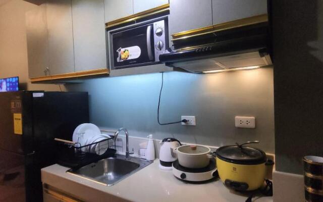 OYO 936 Yumis Condotel Trees Residences