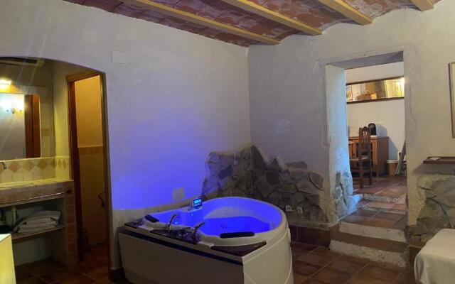 La Olivera APARTHotel Rural Suites bañera hidro o Jacuzzi privados