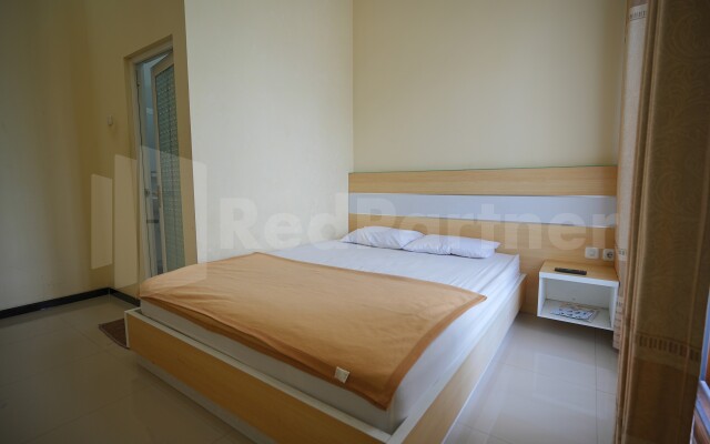 One & Quin Guest House Syariah