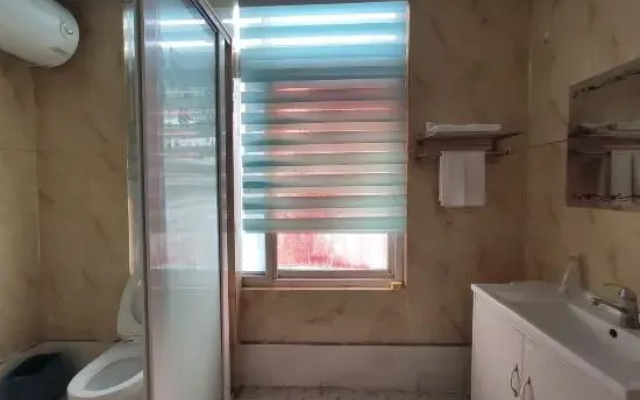 Qufu Wan'ai Theme Homestay (Jining College Commercial East Street Branch)