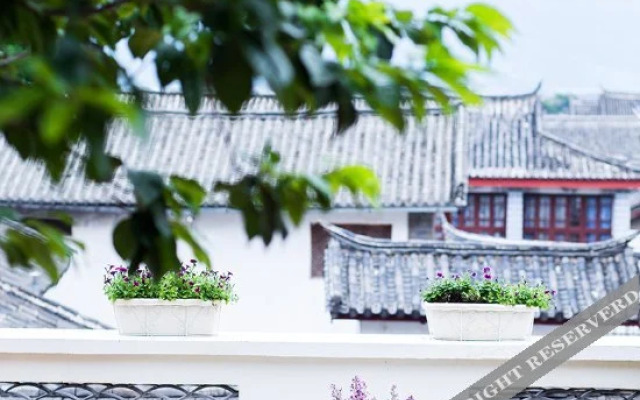 Zen Holiday Inn (Lijiang Ancient City Sifang Street)