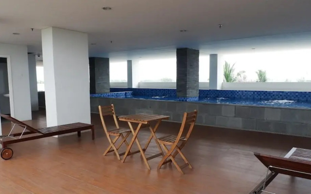 Homey And Cozy Living Studio At Poris 88 Apartment