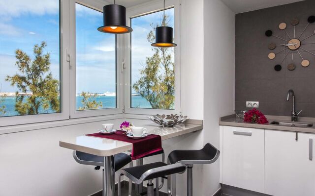 Coral Bay Beachfront Apartment by Vacanzy Collection