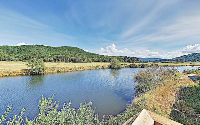 New Listing! Spacious Riverfront Gem W/ Firepit 3 Bedroom Home