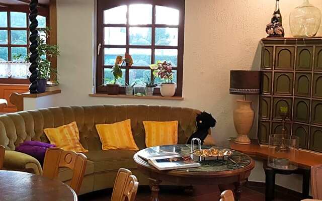Weinhaus em Wingert