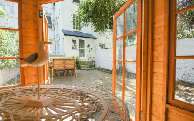 Brunswick Garden Studio Patio by Brighton Holiday Lets