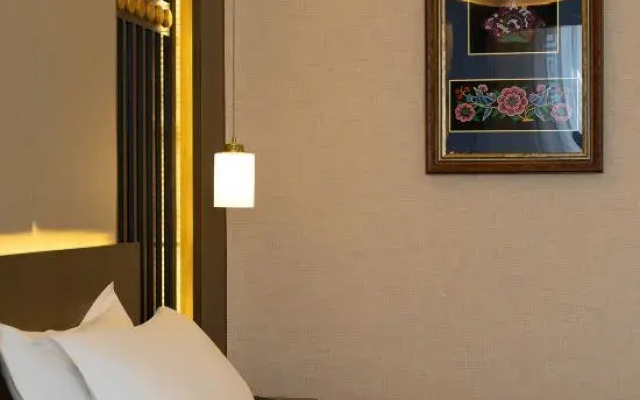 Maoxian Ancient Qiangcheng Yihuatang Hotel
