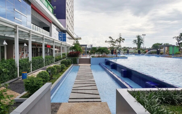Restful and Tidy 2BR at Green Pramuka City Apartment