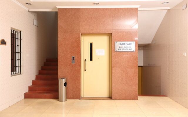 Blossoms Hotel and Service Apartment