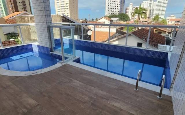 Lindo apto com piscina em Praia Grande
