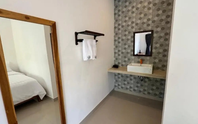Tulambubu Dive Resort – Guest Rooms – Purwakerti