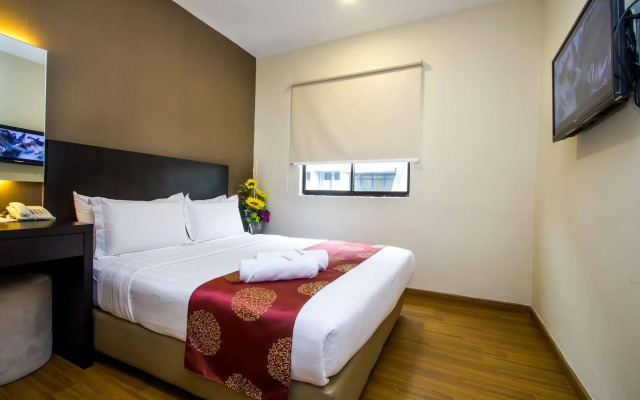 Capital O 91074 Grand World Hotel