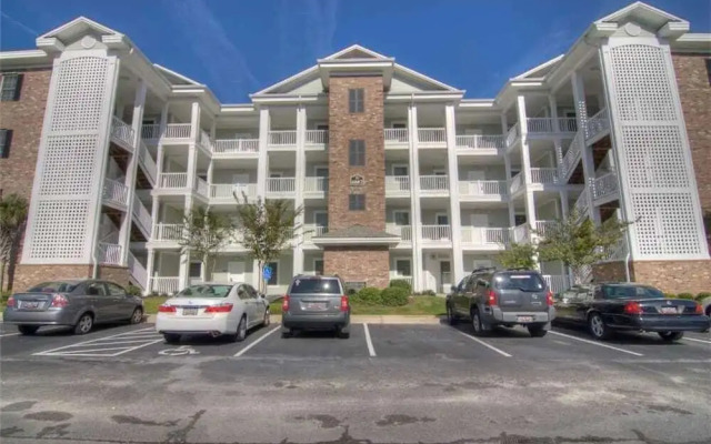 Magnolia Pointe 104-4887 Condo