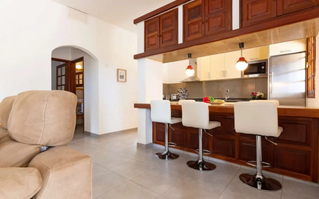 Casa de vacaciones con piscina compartida en Mogán IV