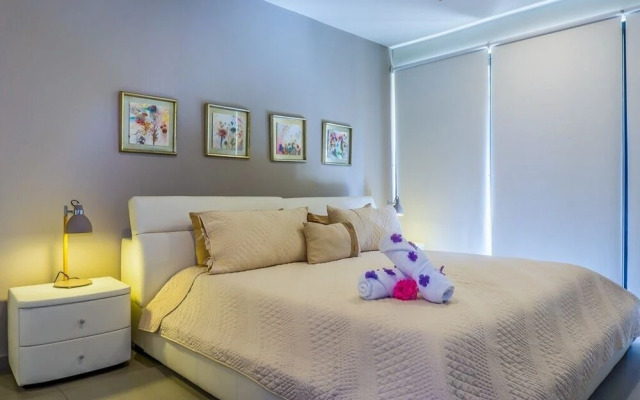 Lunada 314 Modern Playa del Carmen Condo with Tropical Garden View by RedAwning