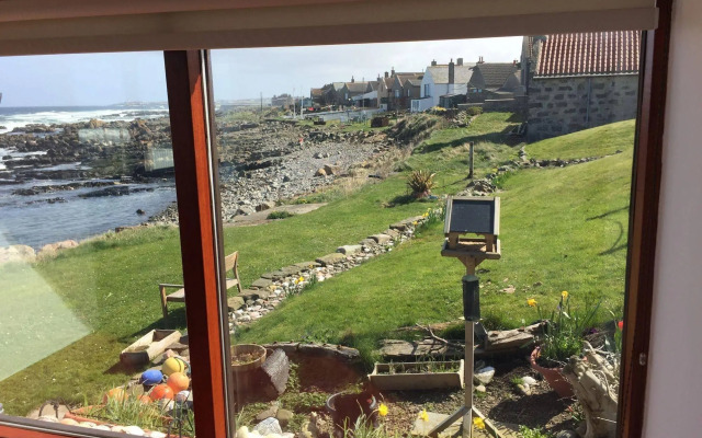Pew With a View - Seafront Cottages