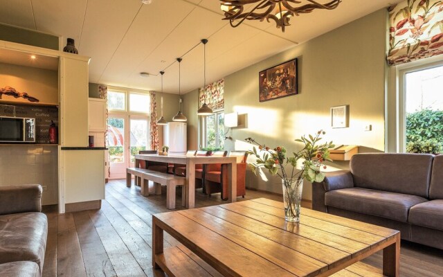 Characteristic house with a garden, surrounded by forest