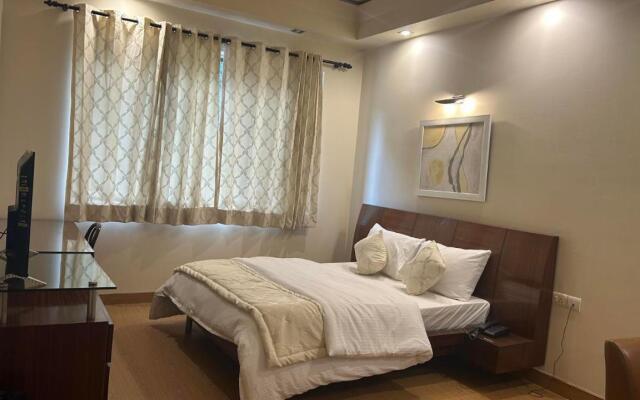 Enkay Suites - DLF CyberCity