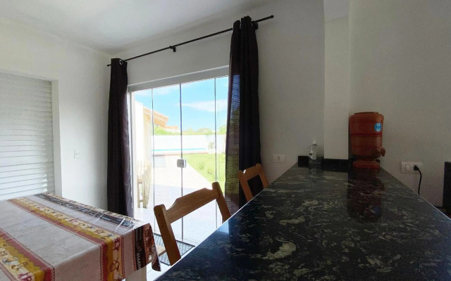 Maravilhoso sobrado com piscina e cascata