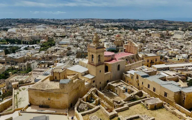 A Pretty Duplex Apartment in a Gozo Village Square