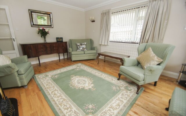 Dean Court Bungalow Parking by Brighton Holiday Lets