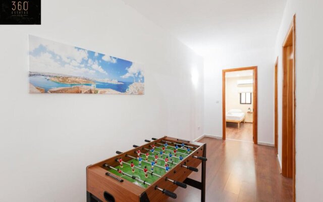 Spacious apt with table soccer just off promenade by 360 Estates