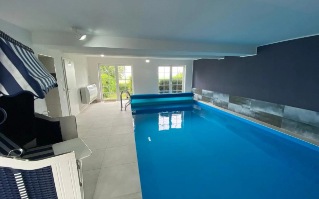 Ferienwohnung im Poolhaus mit Ostseeblick