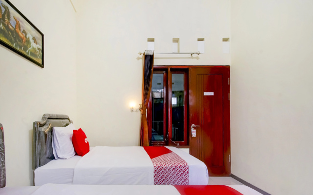 Capital O 90151 Guest House 180