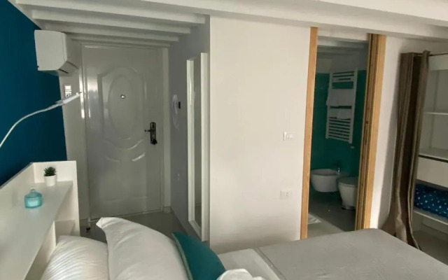 LAGUNA BLU Camera CIELO con terrazza panoramica in comune