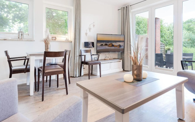 Ferienwohnung Deichblick mit Terrasse m Kaiserhof 1