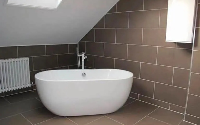 Seafront house with garden seating and stunning sea views!