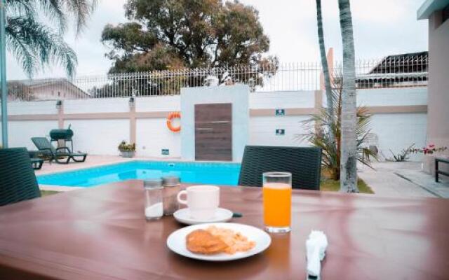 Urdesa Suites Hotel