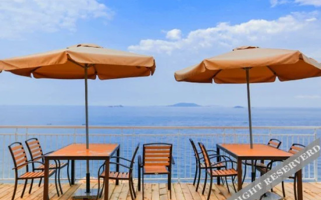 Qingdao Yuehuo Meishu ApartHotel