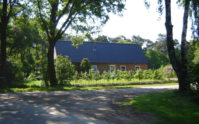 Holiday home in a rural location in Vessem, North Brabant, with sauna and hot tub