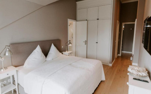Heikendorf Penthouse Suite by Belvilla