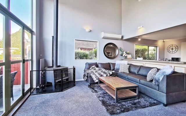 Mountain, lake, sun and this sensational home