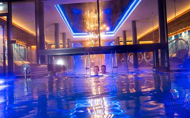 Hüttenhof - Wellnesshotel & Luxus-Bergchalets - Adults only