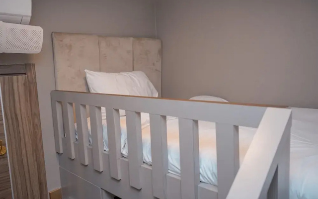 Warm Living 3BR at Sky House BSD Apartment