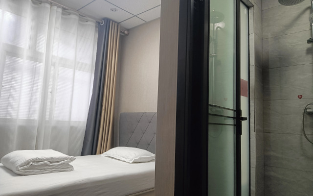 Dexin Express Hotel (Zhangqiu Harmony Plaza)