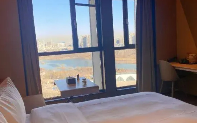 Orange Hotel (Linyi Calligraphy Plaza)