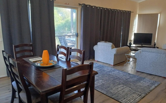 Elevated holiday house in bush setting overlooking wetlands