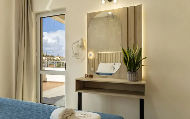 Theos village apartments
