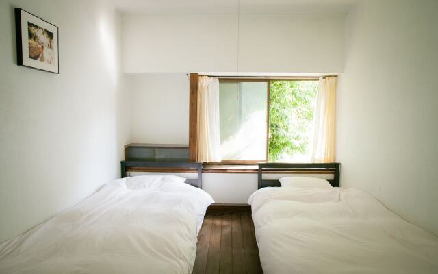 Guesthouse Madoka - Hostel